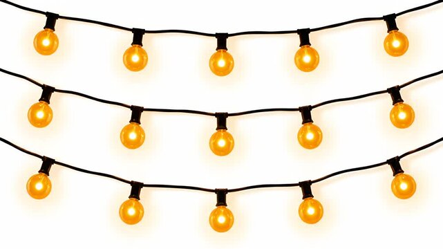 Multiple strings of round incandescent bulbs on black wire against white background