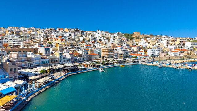 The pictursque port of Sitia, Crete, Greece at sunset. Sitia is a traditional town at the east Crete near the beach of palm trees, Vai.  