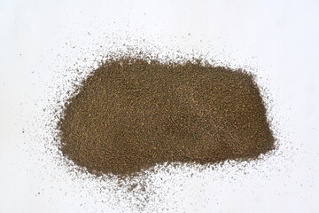 Black tea powder isolated on white background