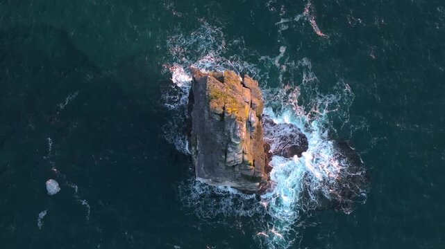 4K cinematic drone footage of Cliffs of Moher at sunset with dramatic golden-hour colours and Atlantic Ocean views. Ireland_031