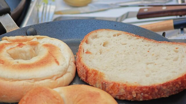 Grilled bagle and butter for breakfast.