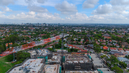 Panoramic Aerial Drone view of Inner Western Suburbs of Sydney housing, roof tops, the streets and the parks, the roads and trees of Ashbury Ashfield Burwood Summer Hill Canterbury and Campsie in Sydn