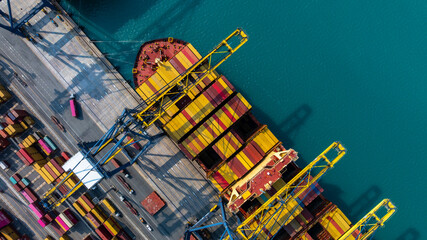 Aerial view Container cargo ship loading unloading container import export sea port, Global trade business container cargo ship freight shipping commercial trade logistic transportation international. © Kalyakan