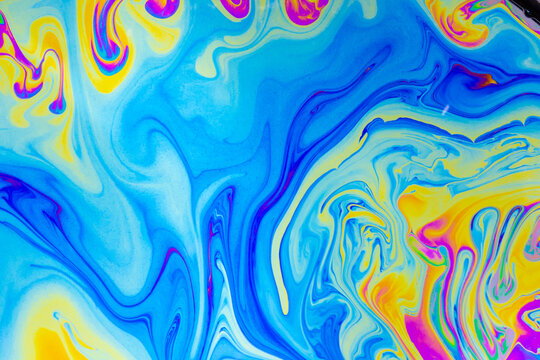 Psychedelic multicolored background abstract. Rainbow colors. patterns background. Photo macro shot of soap bubbles