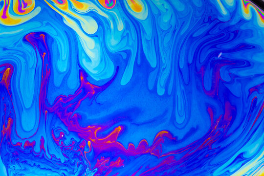 Psychedelic multicolored background abstract. Rainbow colors. patterns background. Photo macro shot of soap bubbles