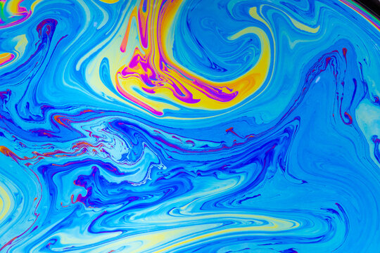 Psychedelic multicolored background abstract. Rainbow colors. patterns background. Photo macro shot of soap bubbles
