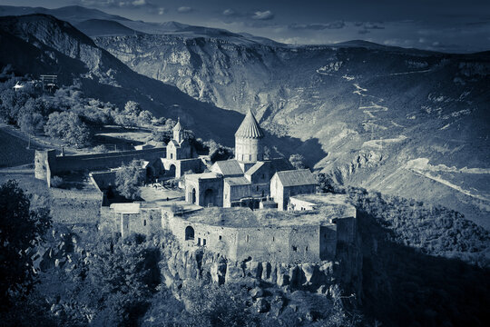 View of Tatev Monastery - 9th-century Armenian Apostolic Christian monastery standing on a large basalt plateau on the edge of a deep gorge of the Vorotan River. Syunik Province, Tatev, Armenia 