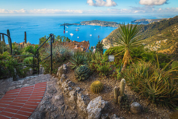 Naklejka premium Beautiful pedestrian walkway in the ornamental garden of Eze