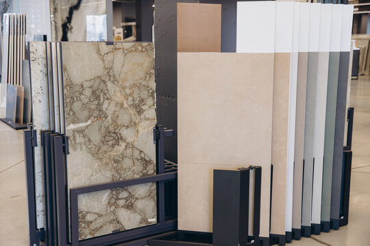 Displaying a variety of large format ceramic tiles and natural stone slabs for modern interior design and home renovation projects