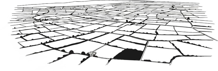 Overhead view of patchwork farmland with a distant hill and a small structure © Kemeja