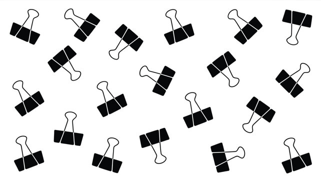 Multiple black binder clips on white background for office organization