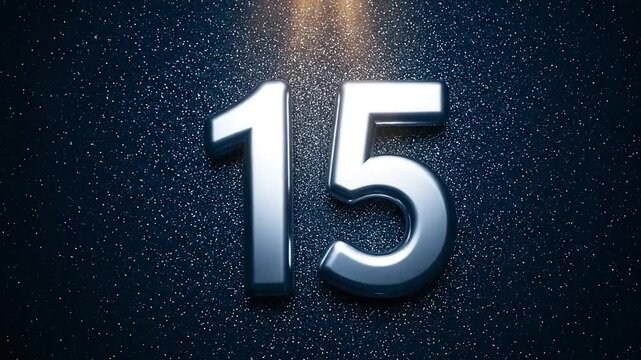 Shiny metallic number fifteen against dark sparkling background