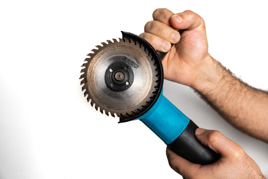 Hand Holding Angle Grinder with Cutting Disc