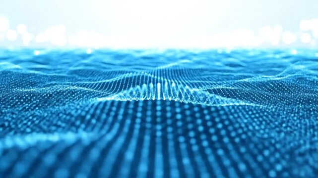 A digital abstract wave pattern flows across the screen in a futuristic landscape viewed from a low angle