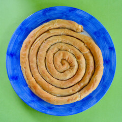 Spanakopita on a serving dish