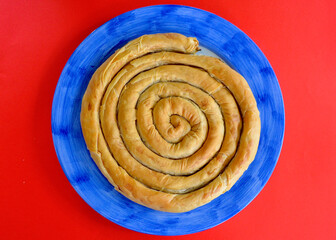 Spanakopita on a serving dish