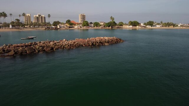 Aerial shot taken with a drone of a small pier with pelicans in the city of Lecher&iacute;a, located in Venezuela