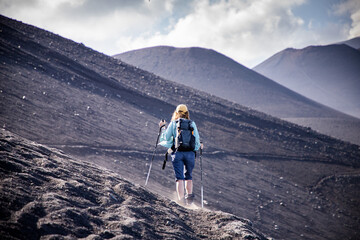 Fototapeta premium hiker trekking on mount Etna