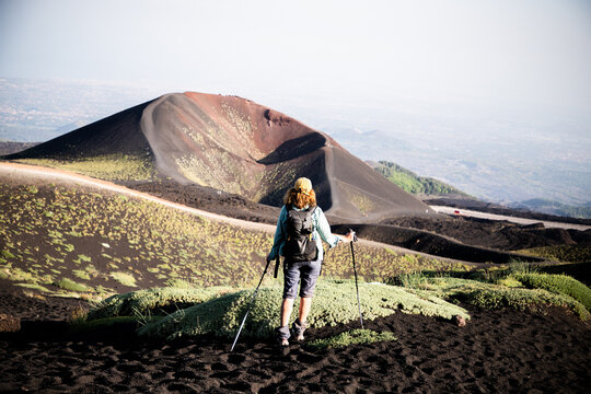 hiker trekking on mount Etna