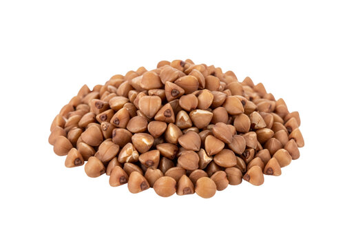 A pile of brown buckwheat groats on a white background. isolated on transparent background