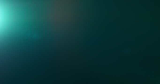 Anamorphic lens flare burst in slow motion, isolated on black background. Cinematic light streaks and optical reflections, ideal for VFX compositing, overlays, sci-fi transitions and film effects.