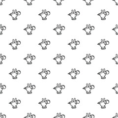 Fototapeta premium Seamless pattern with a hand holding a microphone making a victory doodle gesture