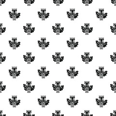 Fototapeta premium Tiki masks and tropical leaves forming a repeating pattern design