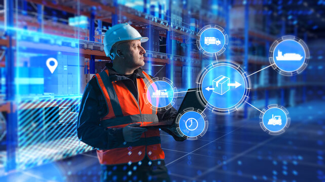Supply chain management, smart logistics. Warehouse manager uses laptop to monitor digital transport network, tracking cargo flow, delivery routes and automated distribution processes.