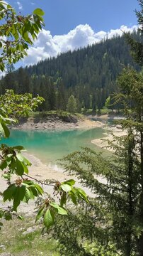 Lake Cauma Caumasee stunning turquoise lake in Flims, Switzerland vertical video