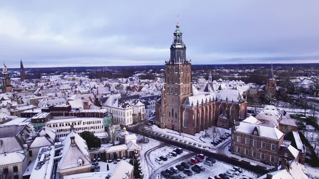 Winter Wonderland picturesque Dutch city in Holland after blizzard snowstorm with recreational port area seen from above