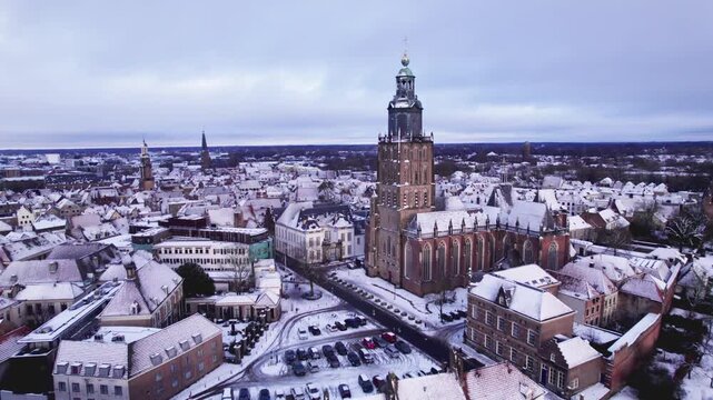 Winter Wonderland picturesque Dutch city in Holland after blizzard snowstorm with recreational port area seen from above
