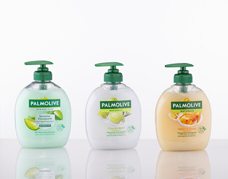 Palmolive Liquid Hand Soaps Trio &ndash; Hygiene Plus Sensitive, Olive & Milk, and Milk & Honey Bottles with Reflection, Studio Pack Shot, Illustrative Editorial