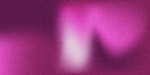 Abstract blurry background in shades of vibrant pink and deep magenta hues