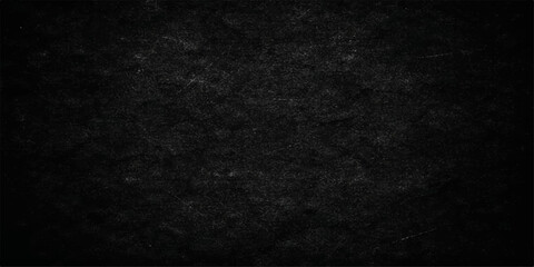 Fototapeta premium A dark grunge background features a rough black paper texture with a vintage gray material surface and blank old canvas pattern for a textured design