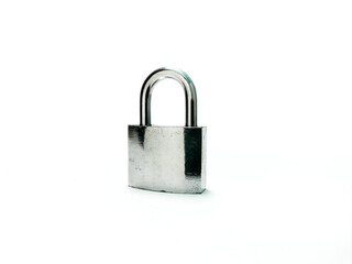 Fototapeta premium Shiny metallic padlock with a rectangular body and U-shaped shackle isolated on white background