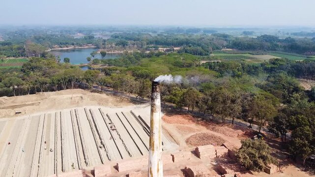 Industrial Smoke Rising from Brick Kiln Chimney &ndash; Aerial View