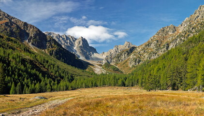 Valais, Switzerland - September 17, 2025: Steep and rocky hiking trail leading to the Col d'Arpette pass (2665m) on the Tour du Mont Blanc (TMB) trek. © Andrei