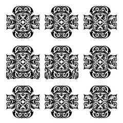Obraz premium Elegant collection of intricate black and white symmetrical vintage floral scrollwork patterns, ideal for decorative graphic design projects and classical embellishments