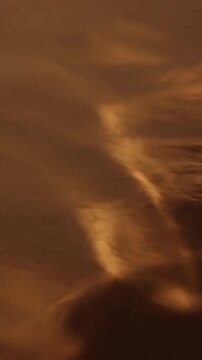 Abstract Firelight Dynamics An artistic depiction of light and shadow in fluid motion, emulating the soft, comforting presence of firelight without showing any discernible source or object.