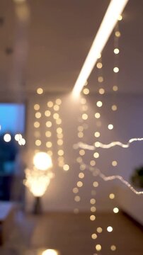 Ethereal Light Trails Minimal, delicate light streaks and subtle points of light, indicative of very slow, minute movements or refractions, all within an interior.