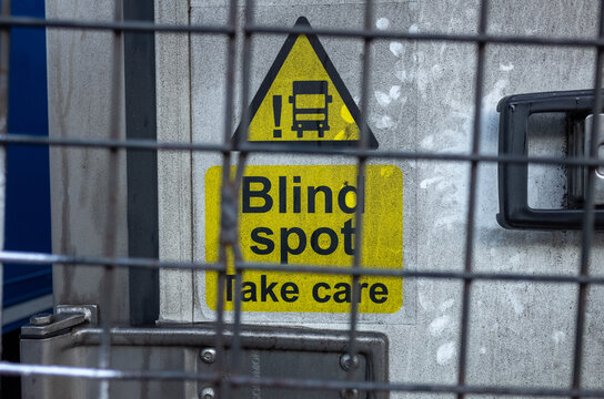 Blind spot sign on truck warning