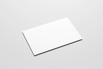 Blank white business card mockup with soft shadows isolated on a minimalist grey background. 3x2 inc