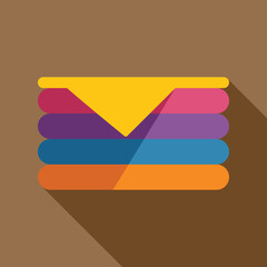 Stack of various colored textiles for laundry or clothing storage with long shadow