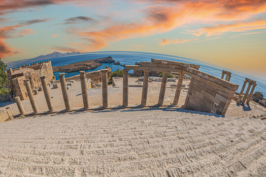 Ruins of Large Propylaea and monumental staircase in front of the sanctuary of goddess Athena Lindia on the Acropolis of Lindos.Built in the 4th century BC, Lindos Acropolis, Rhodes island, Greece