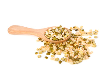 Heap of Dry lentils seeds or vegan protein source in mini wood spoon isolated on white