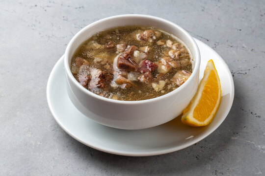 Traditional delicious Turkish food, Turkish traditional tripe soup; iskembe corbasi and offal soup, Turkish Meat Soup Kelle Paca (Turkish name; Kelle paca corbasi)