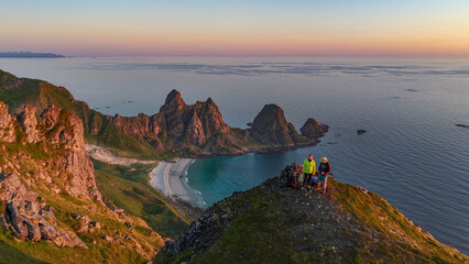 aerial, bird view 2 hikers on Laupen mountain, beautiful hiking destination during midnight sun. Amazing on Vesterålen, vesteralen islands. Sunset, Beautiful hiking destination in arctic Norway, great © Dirk