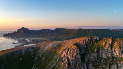 aerial, bird view amazing rock formations Laupen peak near Matind, Måtind mountain, Bleik on Vesterålen, vesteralen islands during midnight sun. Sunset in ocean, Beautiful hiking destination in arctic © Dirk