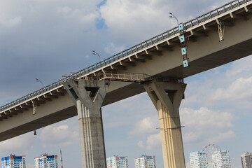 Bridge structure in Volgograd, Russia under a cloudy sky