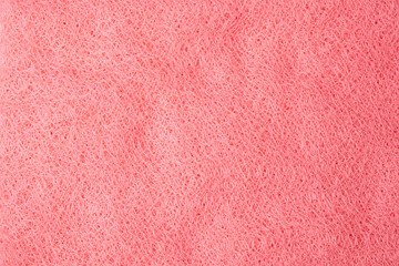 Fototapeta premium Detailed close up of vibrant pink interwoven synthetic material texture background pattern